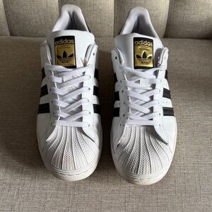 Adidas Men's White and Black Sneakers with Gold Accents